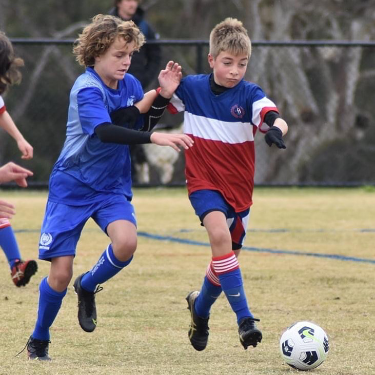 I was really happy with this game. Pictured playing against the eventual Queensland u12 midfielder f